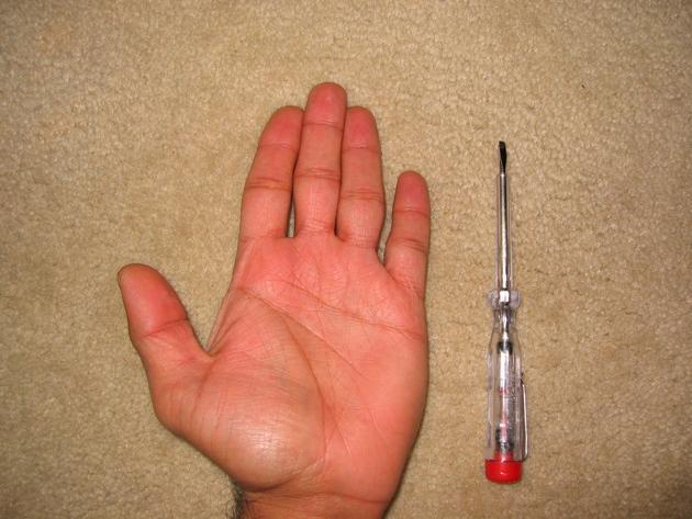 Fingers and Flat Head Screw Drivers
